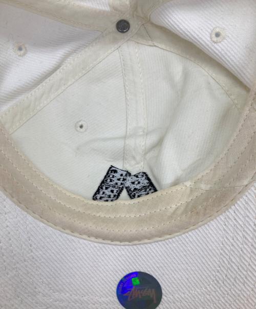 stussy（ステューシー）stussy (ステューシー) dice sanpback cap アイボリーの古着・服飾アイテム