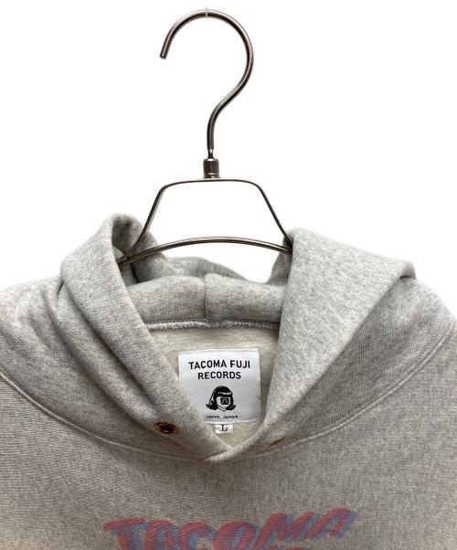 TACOMA FUJI RECORDS（タコマ フジ レコード）TACOMA FUJI RECORDS (タコマ フジ レコード) ロゴプリントパーカー グレー サイズ:Ｌの古着・服飾アイテム