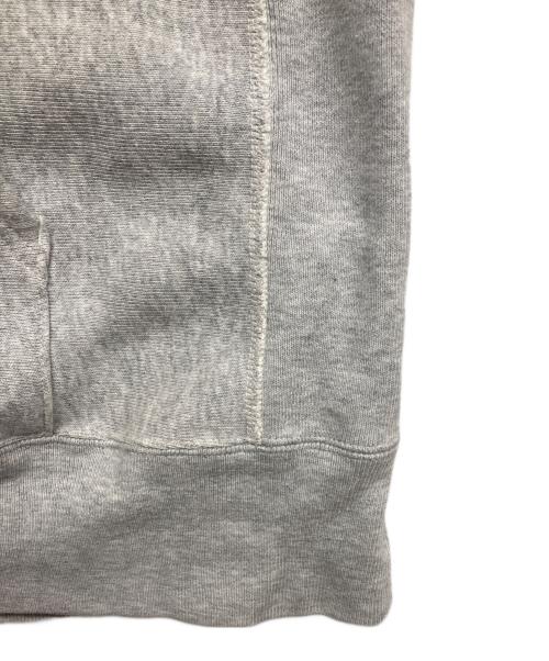 Champion（チャンピオン）Champion (チャンピオン) stussy (ステューシー) ロゴリバースウィーブパーカー グレー サイズ:Lの古着・服飾アイテム