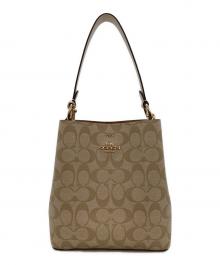 COACH（コーチ）の古着「スモール タウン バケット バッグ」｜ベージュ