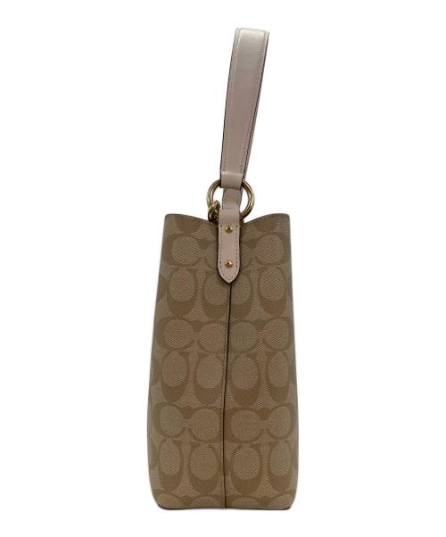 COACH（コーチ）COACH (コーチ) スモール タウン バケット バッグ ベージュの古着・服飾アイテム