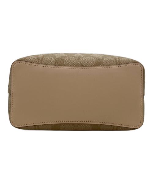 COACH（コーチ）COACH (コーチ) スモール タウン バケット バッグ ベージュの古着・服飾アイテム
