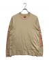 Supreme（シュプリーム）の古着「INTARSIA SLEEVE LONG-TOP」｜オレンジ×ベージュ
