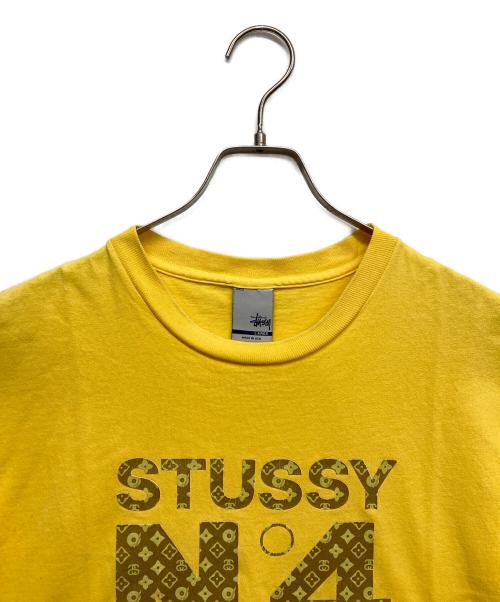 stussy（ステューシー）stussy (ステューシー) モノグラムTシャツ イエロー サイズ:Lの古着・服飾アイテム