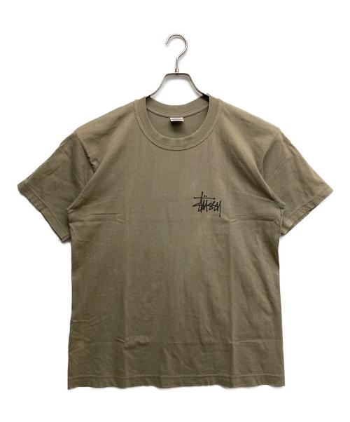 stussy（ステューシー）stussy (ステューシー) WORLD TOUR プリントTシャツ ベージュ サイズ:Lの古着・服飾アイテム