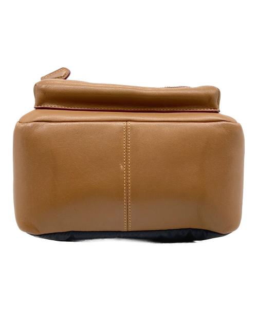 COACH（コーチ）COACH (コーチ) Disney (ディズニー) ディズニーコラボミニリュック ブラウンの古着・服飾アイテム