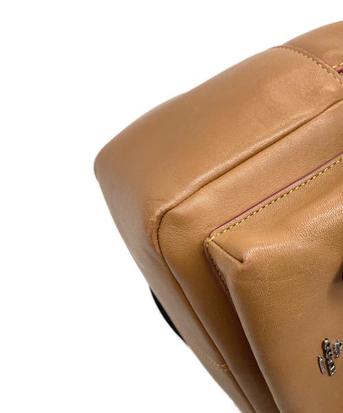 COACH（コーチ）COACH (コーチ) Disney (ディズニー) ディズニーコラボミニリュック ブラウンの古着・服飾アイテム
