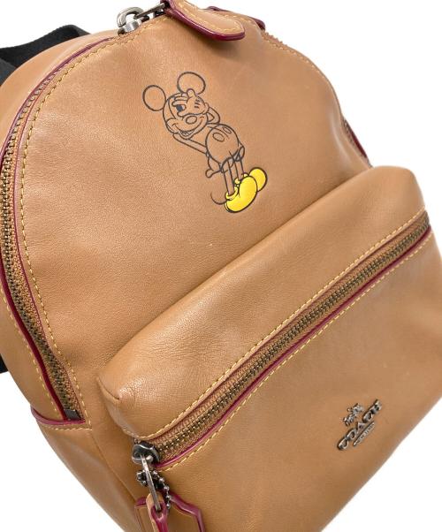COACH（コーチ）COACH (コーチ) Disney (ディズニー) ディズニーコラボミニリュック ブラウンの古着・服飾アイテム