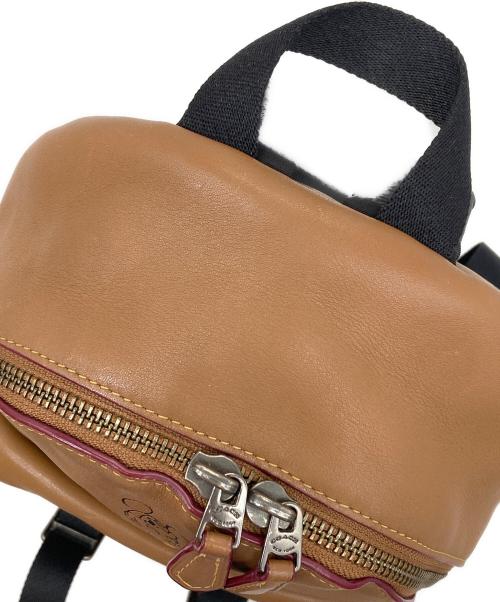 COACH（コーチ）COACH (コーチ) Disney (ディズニー) ディズニーコラボミニリュック ブラウンの古着・服飾アイテム