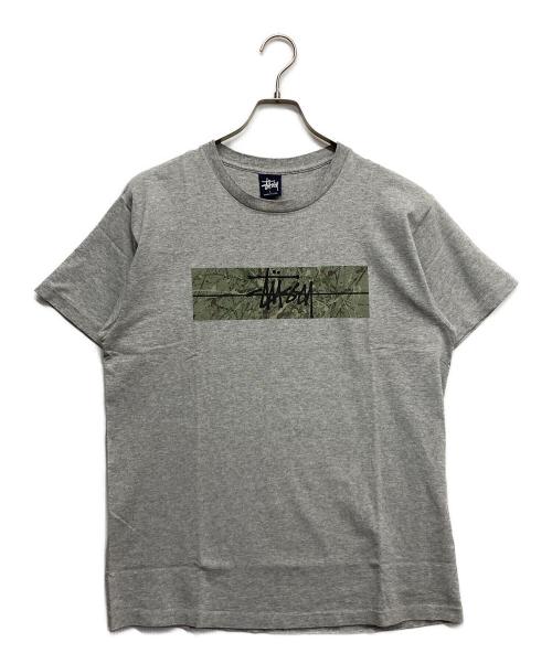 stussy（ステューシー）stussy (ステューシー) プリントTシャツ ライトグレー サイズ:Lの古着・服飾アイテム