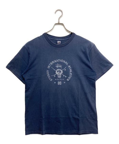 stussy（ステューシー）stussy (ステューシー) スカルインターナショナルプリントTシャツ ネイビー サイズ:Lの古着・服飾アイテム