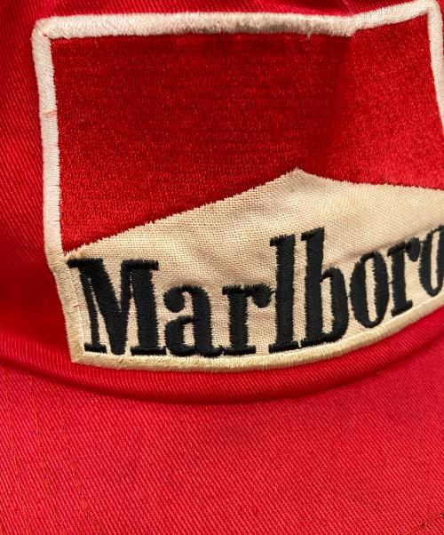 USED（ユーズド）USED (ユーズド) ロゴキャップ アイボリー×レッドの古着・服飾アイテム