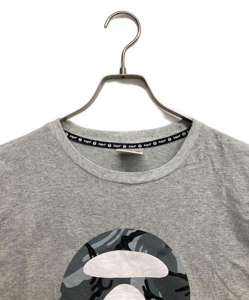Aape BY A BATHING APE（エーエイプ バイ アベイシングエイプ）AAPE BY A BATHING APE (エーエイプ バイ アベイシングエイプ) プリントTシャツ グレー サイズ:Mの古着・服飾アイテム