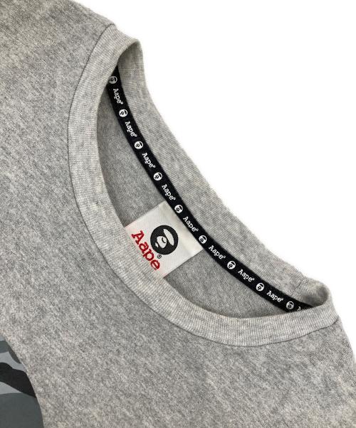 Aape BY A BATHING APE（エーエイプ バイ アベイシングエイプ）AAPE BY A BATHING APE (エーエイプ バイ アベイシングエイプ) プリントTシャツ グレー サイズ:Mの古着・服飾アイテム