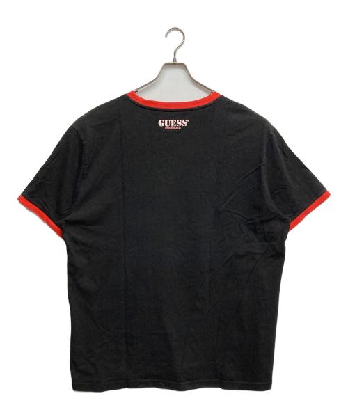 GUESS（ゲス）GUESS (ゲス) MICKEY&FRIENDS Tシャツ レッド×ブラック サイズ:XLの古着・服飾アイテム