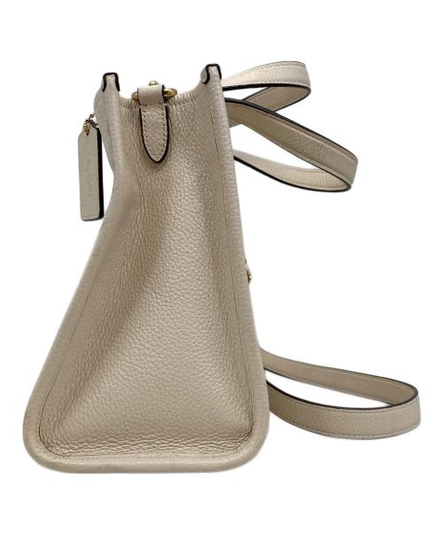 COACH（コーチ）COACH (コーチ) デンプシー キャリーオール ウィズ パッチ ホワイトの古着・服飾アイテム
