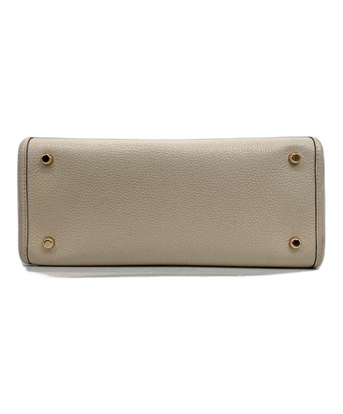 COACH（コーチ）COACH (コーチ) デンプシー キャリーオール ウィズ パッチ ホワイトの古着・服飾アイテム
