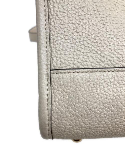 COACH（コーチ）COACH (コーチ) デンプシー キャリーオール ウィズ パッチ ホワイトの古着・服飾アイテム