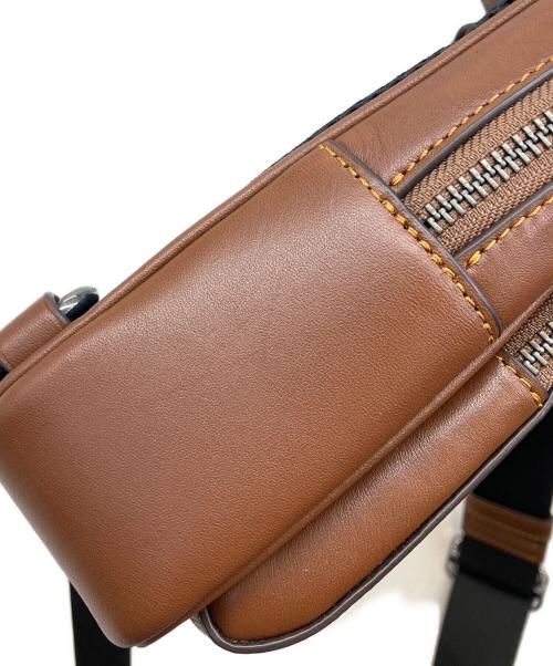 COACH（コーチ）COACH (コーチ) シグネチャー スヌーピー プリントバッグ ブラウンの古着・服飾アイテム