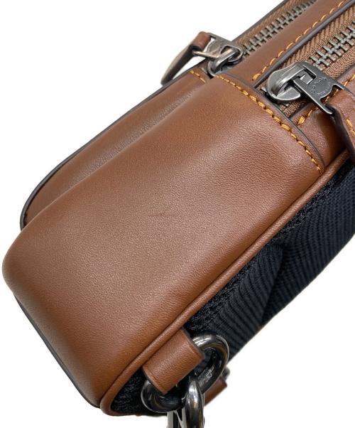 COACH（コーチ）COACH (コーチ) シグネチャー スヌーピー プリントバッグ ブラウンの古着・服飾アイテム