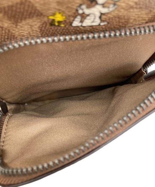 COACH（コーチ）COACH (コーチ) シグネチャー スヌーピー プリントバッグ ブラウンの古着・服飾アイテム