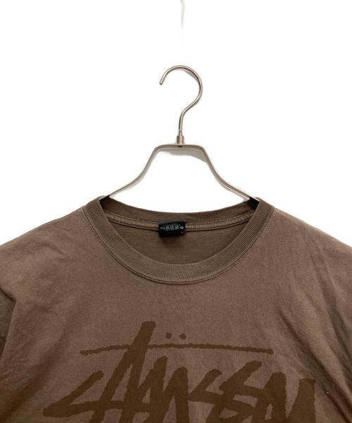 stussy（ステューシー）stussy (ステューシー) SSリンクワールドツア―T ブラウン サイズ:Lの古着・服飾アイテム
