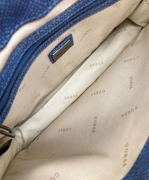 GUESS（ゲス）GUESS (ゲス) IN LOVE TOP HANDLE FLAP インディゴの古着・服飾アイテム