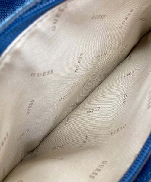 GUESS（ゲス）GUESS (ゲス) IN LOVE TOP HANDLE FLAP インディゴの古着・服飾アイテム