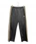 Needles（ニードルズ）の古着「Track Pant」｜イエロー×グレー