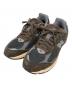 NEW BALANCE（ニューバランス）の古着「ローカットスニーカー」｜グレー×ブラウン