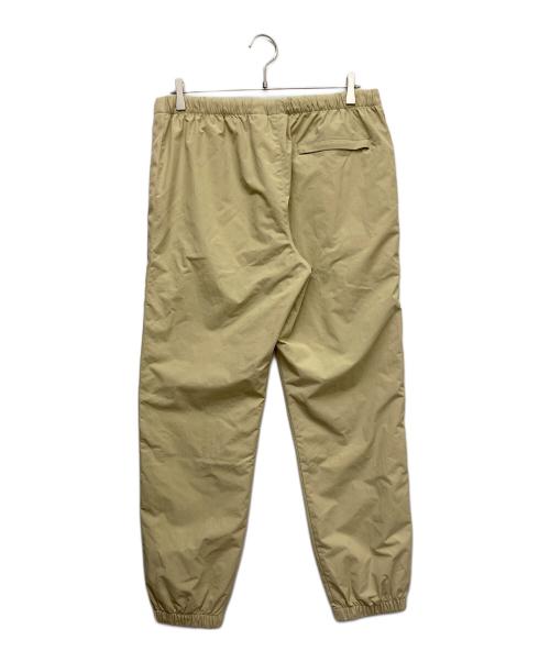 stussy（ステューシー）stussy (ステューシー) ナイロンジョガーパンツ ベージュ サイズ:Mの古着・服飾アイテム