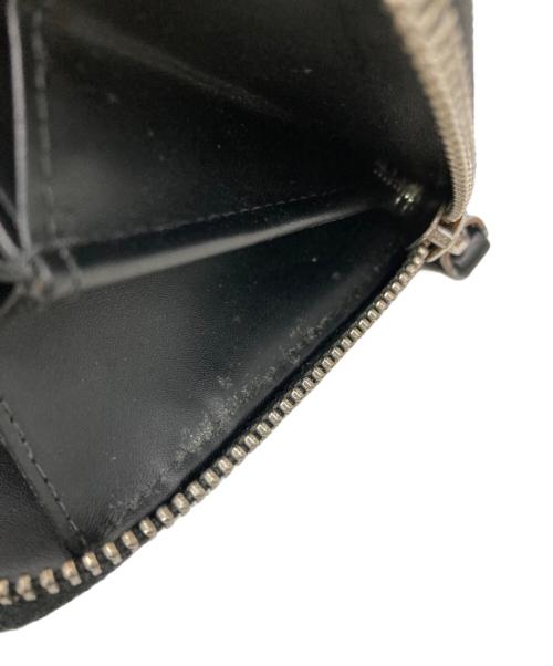 EMPORIO ARMANI（エンポリオアルマーニ）EMPORIO ARMANI (エンポリオアルマーニ) ラウンドジップウォレット ブラックの古着・服飾アイテム