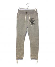 POLO RALPH LAUREN（ポロ・ラルフローレン）の古着「カレッジプリントスウェットパンツ」｜グレー