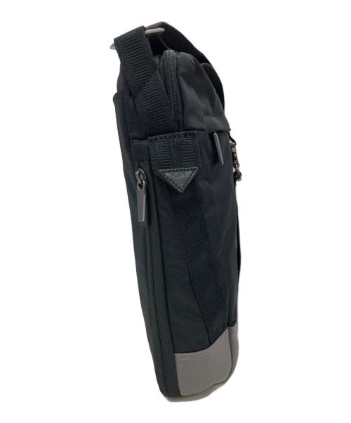 TUMI（トゥミ）TUMI (トゥミ) メタルバックル ショルダーバッグ ブラックの古着・服飾アイテム