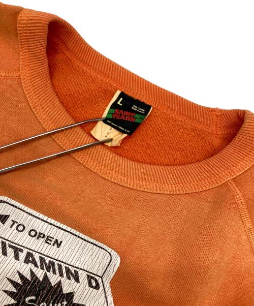 SAINT MICHAEL（セントマイケル）SAINT MICHAEL (セントマイケル) Denim Tears (デニムティアーズ) MILK PACK CREWNECK SWEAT オレンジ サイズ:Lの古着・服飾アイテム