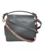 COCOCELUX GOLDココセリュックスゴールド）の古着「タッセル付きワンハンドル 3WAYバッグ」｜ブラック×レッド