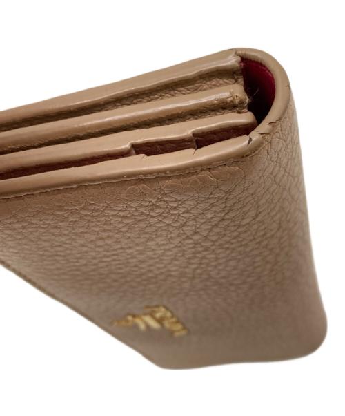 PRADA（プラダ）PRADA (プラダ) 長財布 ベージュ×ピンクの古着・服飾アイテム