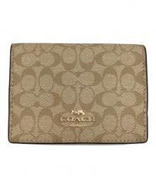COACH（コーチ）の古着「オリガミ スモール トライフォールド ウォレット」｜ベージュ