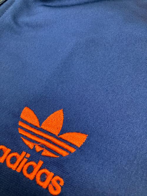 adidas（アディダス）adidas (アディダス) トラックジャケット オレンジ×ネイビー サイズ:XSの古着・服飾アイテム