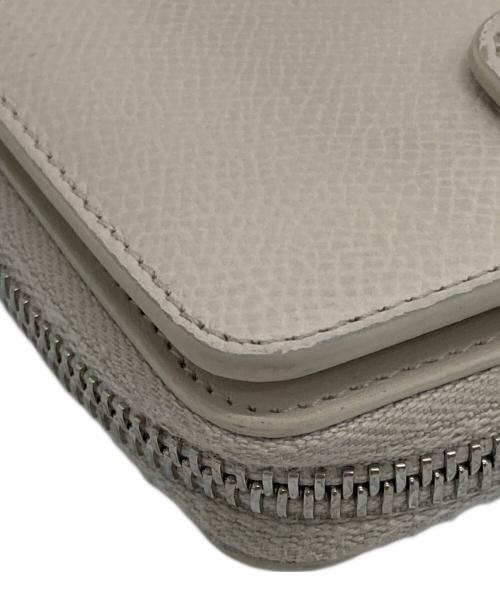 Maison Margiela（メゾンマルジェラ）Maison Margiela (メゾンマルジェラ) 4ステッチジップアラウンドコンパクトウォレット ホワイトの古着・服飾アイテム