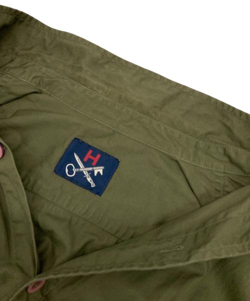 HAWKWOOD MERCANTILE（ホークウッドマーカンタイル）HAWKWOOD MERCANTILE (ホークウッドマーカンタイル) ミリタリーシャツ オリーブ サイズ:Sの古着・服飾アイテム