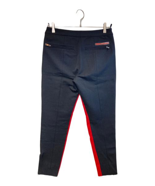 PRADA（プラダ）PRADA (プラダ) バイカラーセンターシームパンツ ネイビー×レッド サイズ:44の古着・服飾アイテム