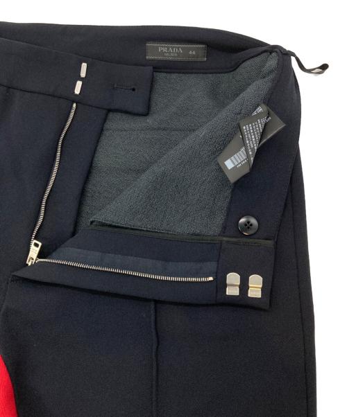 PRADA（プラダ）PRADA (プラダ) バイカラーセンターシームパンツ ネイビー×レッド サイズ:44の古着・服飾アイテム