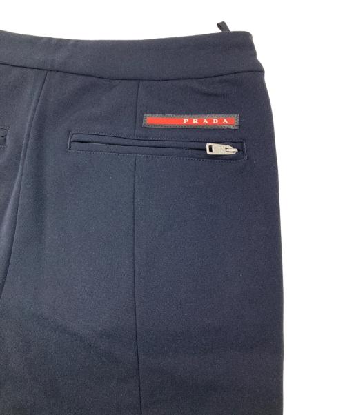 PRADA（プラダ）PRADA (プラダ) バイカラーセンターシームパンツ ネイビー×レッド サイズ:44の古着・服飾アイテム