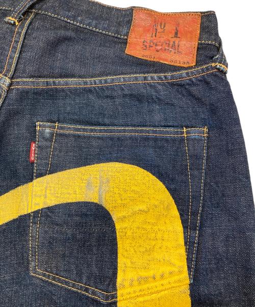 EVISU（エヴィス）EVISU (エヴィス) 大黒ビッグカモメペイントデニムパンツ インディゴ×イエロー サイズ:W36×L35の古着・服飾アイテム