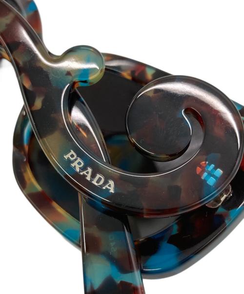 PRADA（プラダ）PRADA (プラダ) ミニマルバロック バタフライテンプルサングラス ブラウン×ブルー サイズ:SIZE 54□19　135の古着・服飾アイテム