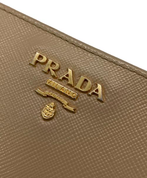PRADA（プラダ）PRADA (プラダ) 2つ折り財布 ベージュの古着・服飾アイテム