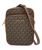 MICHAEL KORSマイケル・コース）の古着「Jet Set Travel Medium Signature Logo Crossbody Bag」｜ブラウン