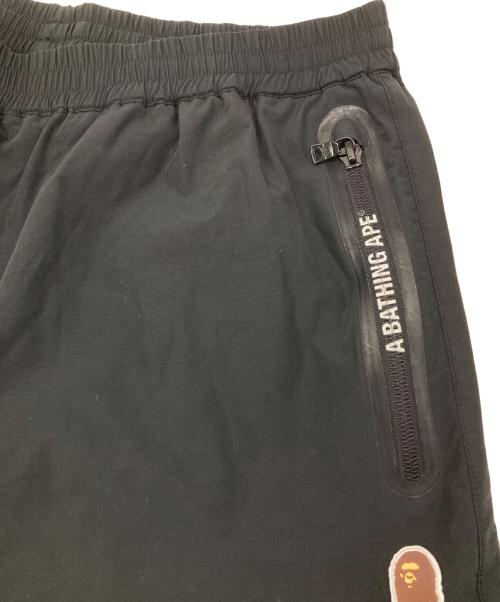 A BATHING APE（ア ベイシング エイプ）A BATHING APE (ア ベイシング エイプ) シェルトラックパンツ ブラック サイズ:Lの古着・服飾アイテム