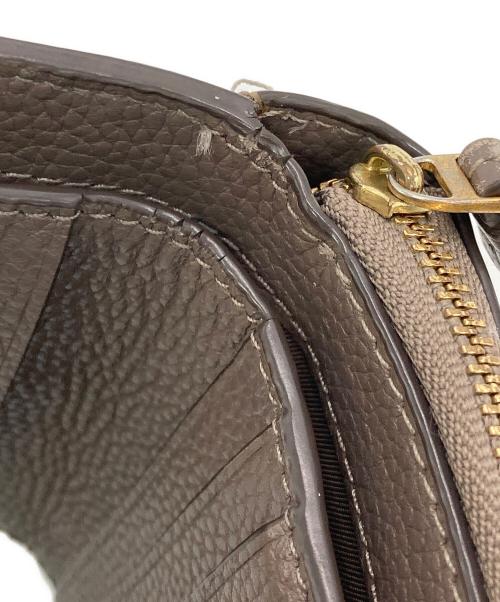 TORY BURCH（トリーバーチ）TORY BURCH (トリーバーチ) マックグロー バイフォールド ウォレット ブラウンの古着・服飾アイテム